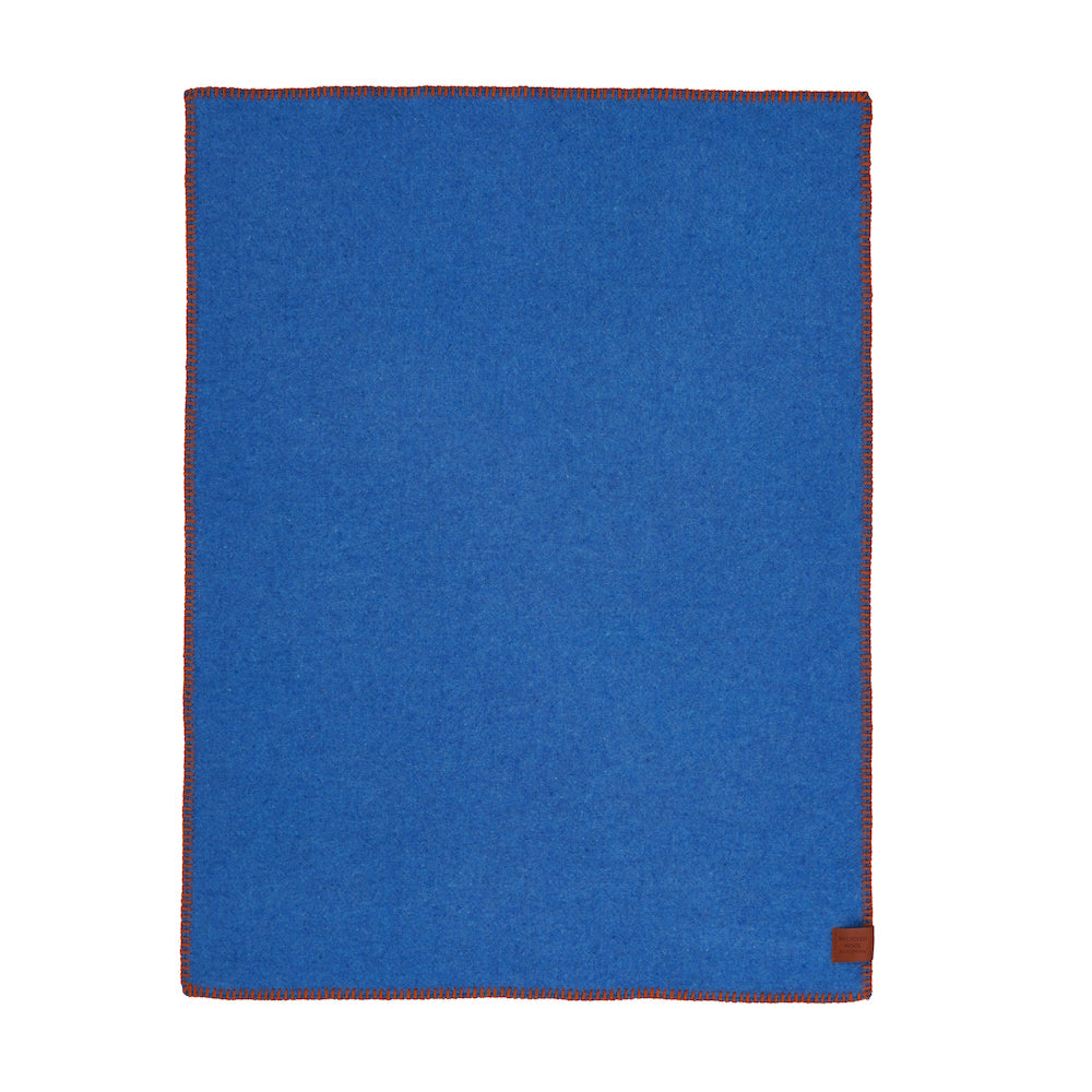 Klippan Cozy Baby blue wool blanket with orange edging