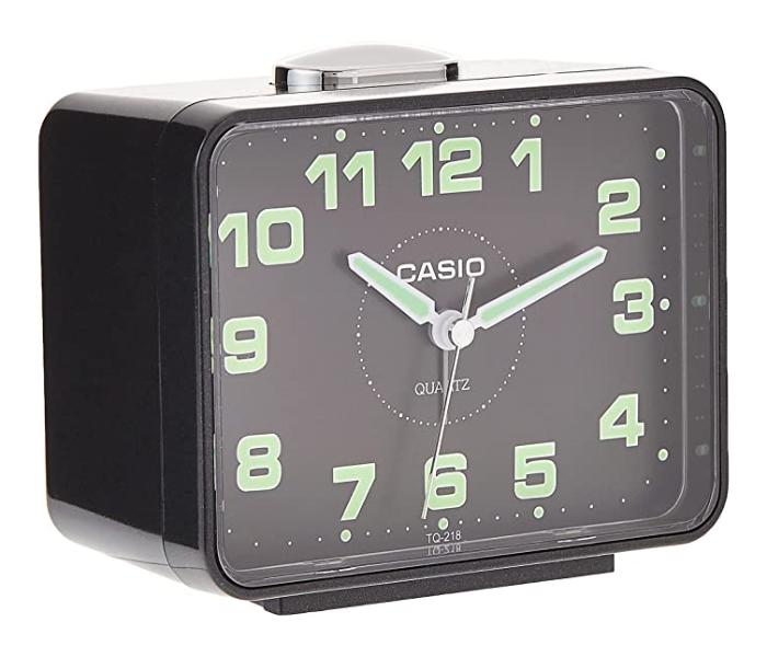 Casio TQ218-1DF black resin alarm clock, angled view